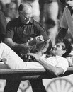 Bernard Thomas, the England physio, tends to Terry Alderman as he is stretchered off, Australia v England, 1st Test, Perth, November 12, 1982