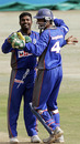 Muttiah Muralitharan and Kumar Sangakkara celebrate after the fall of Mark Boucher in the first match of the Afro-Asia Cup. Asia XI lost out in a low-scoring battle