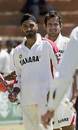 Harbhajan Singh holds a commemorative stump after taking his 200th Test wicket yesterday, India v Zimbabwe, Bulawayo, September 16, 2005