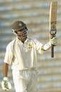 Shoaib Malik raises his bat on reaching his hundred, Australia A v Pakistan A, Lahore, September 25, 2005
