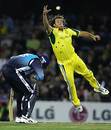 Andrew Symonds jumps high to grab the ball off his own bowling, Australia v World XI, 2nd ODI, Super Series, Melbourne, October 7, 2005
