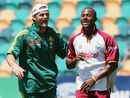 Adam Gilchrist and Dwayne Smith enjoy a game of football, Australia v West Indies, 2nd Test, Hobart, 5th day, November 21, 2005