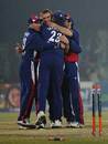Players mob Flintoff after he takes the final wicket, completing a 42-run win for England, Pakistan v England, 1st ODI, Lahore, December 10, 2005
