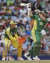 Graeme Smith throws everything behind a drive as he surges towards his century, South Africa v Australia, 1st ODI, Centurion Park, February 26, 2006