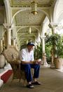 Shaun Udal relaxes with a cup of coffee at the team hotel, Mumbai, March 23 2006