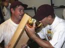 Jimmy Maher and Andy Bichel celebrate the victory in style, Queensland v Victoria, Pura Cup final, Brisbane, 5th day, March 28, 2006