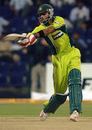 Shoaib Malik in action during Pakistan's run chase, India v Pakistan, DLF Cup, Zayad Cricket Stadium, Abu Dhabi, April 18, 2006