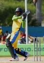 Romel Currency hits out, Grenada v St Vincent, Stanford 20/20, July 26, 2006 	