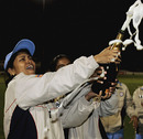 Mithali Raj breaks open the champagne after beating England in the inaugral Twenty20, England Women v India Women, Derby, August 5, 2006