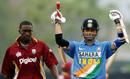 Sachin Tendulkar celebrates his hundred next to Jerome Taylor, India v West Indies, 2nd ODI, DLF Cup, Kuala Lumpur, September 14, 2006