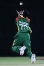 Saqibul Hasan plucks off a superb catch off his own bowling to dismiss Elton Chigumbura, Bangladesh v Zimbabwe, Champions Trophy, Jaipur, October 13, 2006