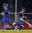 Upul Tharanga and Mahela Jayawardene during the course of their 89-run stand , Sri Lanka v New Zealand, 5th match, Champions Trophy, Mumbai, October 20, 2006