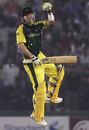 Damien Martyn celebrates Australia's progress to the semi-finals