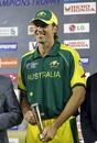 Flying pigeon. Glenn McGrath poses with the man-of-the-match award, Australia v New Zealand, 1st semi-final, Champions Trophy, Mohali, November 1, 2006 
