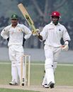 Dwayne Bravo salutes his century during a warm-up game against the Patron's XI, Lahore, November 9, 2006