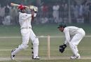 Dwayne Bravo pulls during his century in a warm-up game against the Patron's XI, Lahore, November 9, 2006