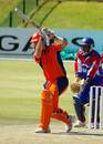 Bas Zuiderent drives during his unbeaten 63, Netherlands v Bermuda, Tri-series, Potchefstroom, November 29, 2006