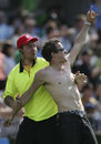 Aren't we a clever boy? A spectator is ejected after giving others the benefits of  seeing his torso, New Zealand v Sri Lanka, 2nd Twenty20, Auckland, December 26, 2006  