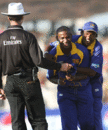 A jubilant Sanath Jayasuriya gets his cap back after bowling Sri Lanka to victory in the final over, India v Sri Lanka, 2nd ODI, Rajkot, February 11, 2007