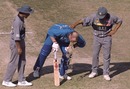 Neil Smith throws up during his innings, England v UAE, Peshawar, February 18, 1996