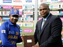 Hasely Crawford, a former Olympic gold medallist, presents the Man-of-the-Match award to Mahela Jayawaradene after Sri Lanka's 243-run win over Bermuda, Bermuda v Sri Lanka, Group B, Trinidad, March 15, 2007