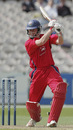 Glen Chapple cracks another four during his swift 66, Lancashire v Warwickshire,  Old Trafford, April 29, 2007