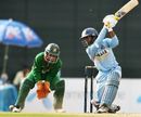 Dinesh Karthik steadied India's run chase with a dogged 58 not out,
Bangladesh v India, 1st ODI, Mirpur, May 10, 2007