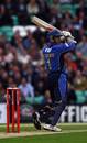 Chris Adams slams a boundary in murky conditions at The Oval, Sussex v Surrey, Twenty20, The Oval, July 5, 2007
