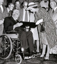 Queen Elizabeth presents Sir Robert Menzies with the Order of Australia during the Centenary Test, Melbourne, March 23, 1977