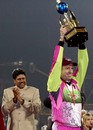 Kapil Dev applauds as Stuart Law lifts the trophy, Chandigarh Lions v Chennai Superstars, final, Indian Cricket League, Panchkula, December 16, 2007 

