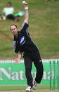 Greg Morgan goes airborne during his follow through, NZCPA Masters XI v New Zealand Under-19, Twenty20 match, Seddon Park, Hamilton, December 23, 2007