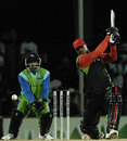 Runako Morton goes for a big hit, Montserrat v Nevis, Stanford 20/20, 1st round, Antigua, February 8, 2008