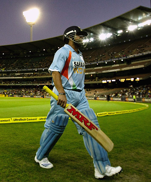 Sachin Tendulkar walks back to the pavilion