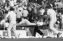 Bernard Thomas, the England physio, tends to Terry Alderman as he is stretchered off, Australia v England, 1st Test, Perth, November 12, 1982