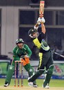 Kamran Akmal looks to clear the boundary, Pakistan v Bangladesh, 4th ODI, Multan, April 16, 2008