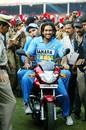 Mahendra Singh Dhoni rides a motorcycle, his Man of the Match prize, India v England, fourth ODI, Kochi