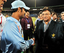 Mahendra Singh Dhoni greets Pakistan President Pervez Musharraf, India v Sri Lanka, Asia Cup final, Karachi, July 6, 2008