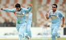 Pragyan Ojha and Rohit Sharma celebrate a wicket, India v Sri Lanka, Super Four, Asia Cup, Karachi, July 3, 2008 
