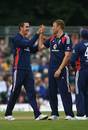 Kevin Pietersen high-fives with Andrew Flintoff after one of his three wickets, Scotland v England, The Grange, Edinburgh, August 18, 2008