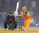 Murray Goodwin gears up for a sweep, Ahmedabad Rockets v Royal Bengal Tigers, Indian Cricket League, 15th match, Ahmedabad, October 22, 2008