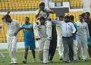 Shivakant Shukla is carried off the field by Praveen Gupta, Tamil Nadu v Uttar Pradesh, Ranji Trophy semi-final, 4th day, Nagpur, January 7, 2009