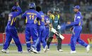 Team-mates rush in to congratulate Muttiah Muralitharan on picking up Shoaib Malik's wicket, Pakistan v Sri Lanka, 2nd ODI, Karachi, January 21, 2009