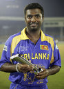 Muttiah Muralitharan with the Man of the Match award, Sri Lanka v New Zealand, 5th match, Champions Trophy, Mumbai, October 20, 2006