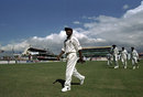 Brian Lara leads his team from the field shortly after the abandonment of the Test, West Indies v England, 1st Test, Jamaica, January 29, 1998