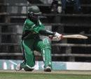 Nehemiah Odhiambo swats the ball towards midwicket, Kenya v Zimbabwe, 3rd ODI, Nairobi, January 31, 2009