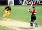 The bails drop as Herschelle Gibbs is clean bowled by Andy Bichel ...Australia v South Africa ODI at the 'Gabba, Brisbane, Sunday January 11th 1998.