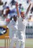 South Africa's fast bowler and captain Shaun Pollock (R) appeals for a wicket against Mahela Jayawardene 04 January 2001 on the third day of the second test between South Africa and Sri Lanka played at the Newlands cricket ground in Cape Town.