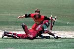 25 Jan 2001: Bryan Strang of Zimbabwe runs out Daren Ganga of the West Indies for six during the Carlton Series One Day International between West Indies and Zimbabwe at the Adelaide Oval in Adelaide, Australia.