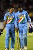 Indian batsmen Ashish Nehra (left) and Javagal Srinath celebrate as they leave the field at the end of the match. India beat New Zealand by one wicket. 6th ODI: New Zealand v India at Eden Park, Auckland, 11 January 2003.
