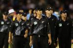 New Zealand captain Stephen Fleming (centre) and Chris Harris (right) leave the field at the end of the match. 6th ODI: New Zealand v India at Eden Park, Auckland, 11 January 2003.